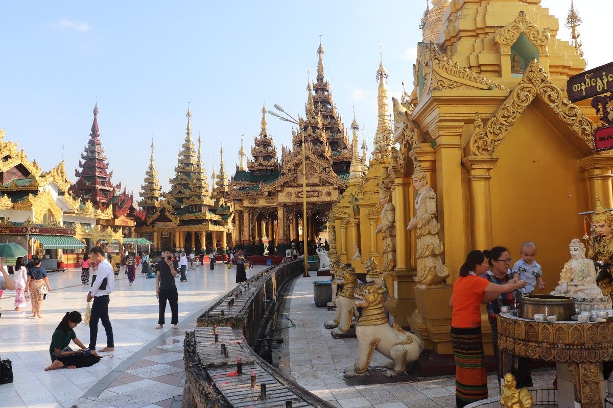 Kandawgyi Lake at Night and the Great Shwedagon Pagoda by Day